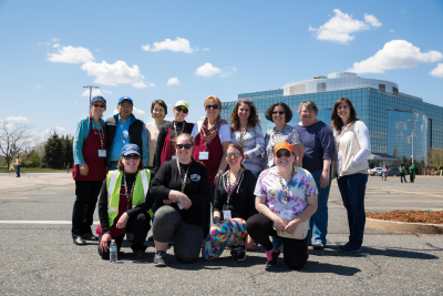Autism Alliance team members outdoors at Bose Mountain at kite day event.