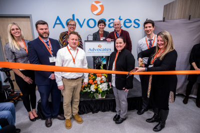 Advocates leadership cutting the ribbon inside Framingham Community Behavioral Health Center.